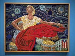 A mosaic of a bomba dancer moving her red dress. The sky is starry and blue.