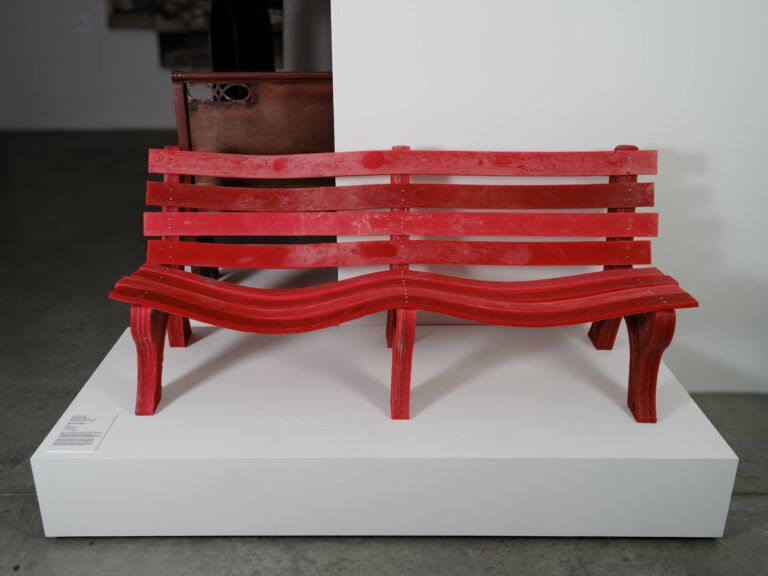 A life-size, freestanding park bench cast entirely in red votive wax. Sculptural installation, performance.